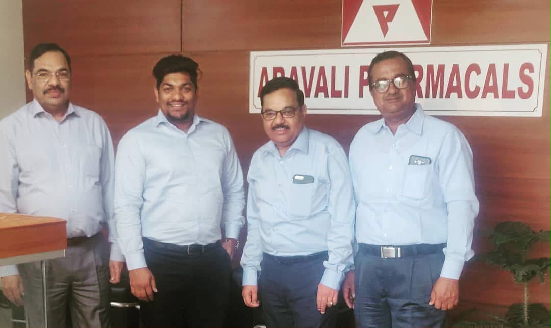 Aanant Goyal with senior leadership at the Aravali Pharmaceuticals annual business meeting